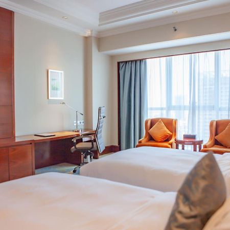 Glory Charm Hotel Fangcheng Exterior photo