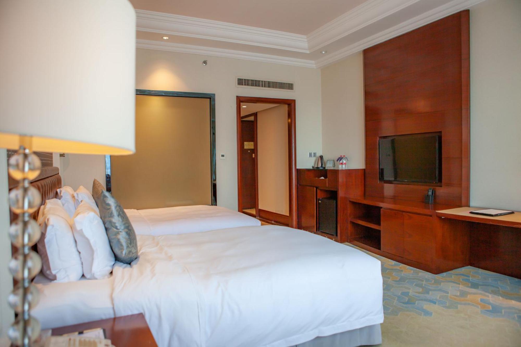 Glory Charm Hotel Fangcheng Exterior photo