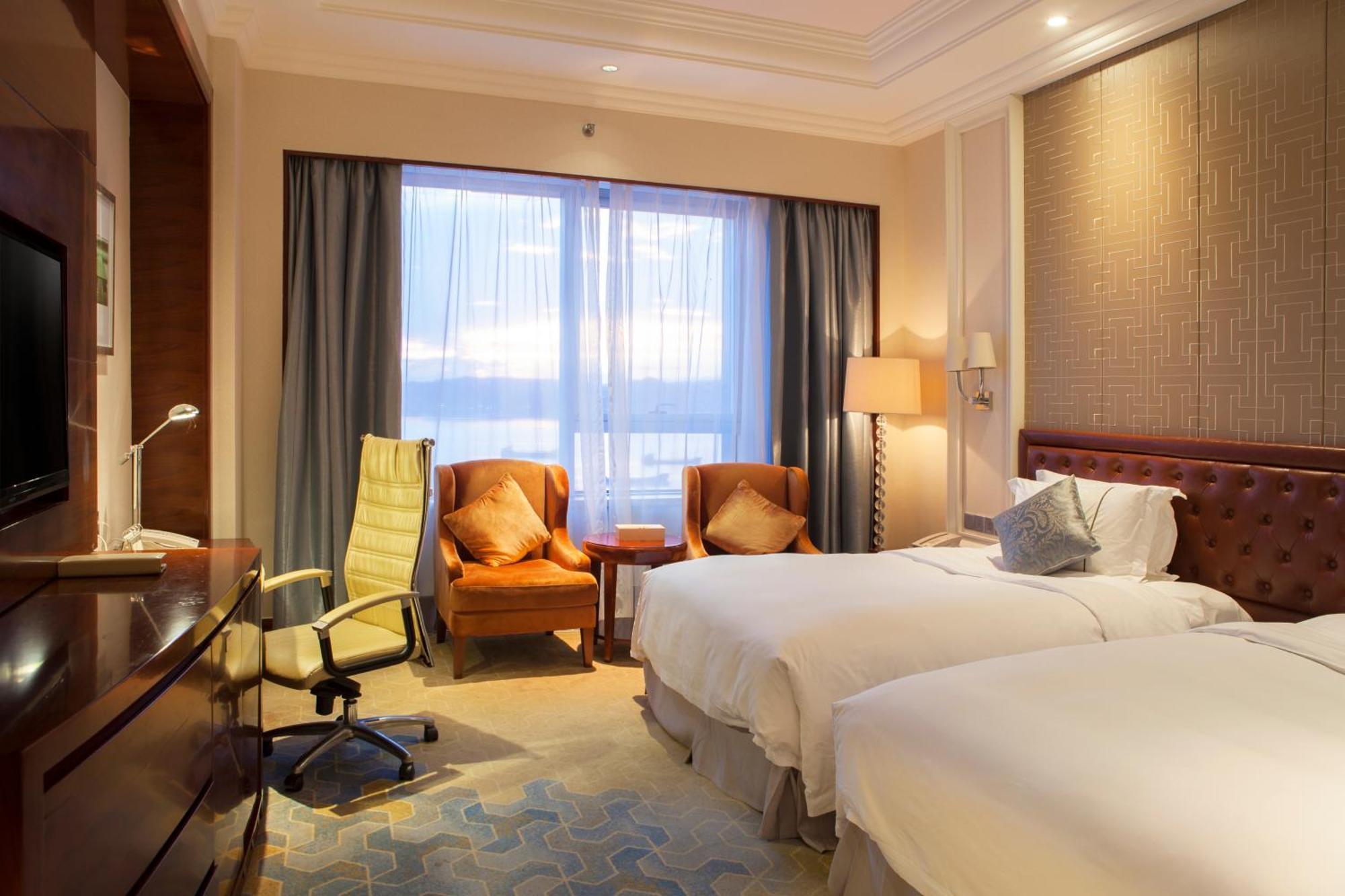 Glory Charm Hotel Fangcheng Exterior photo