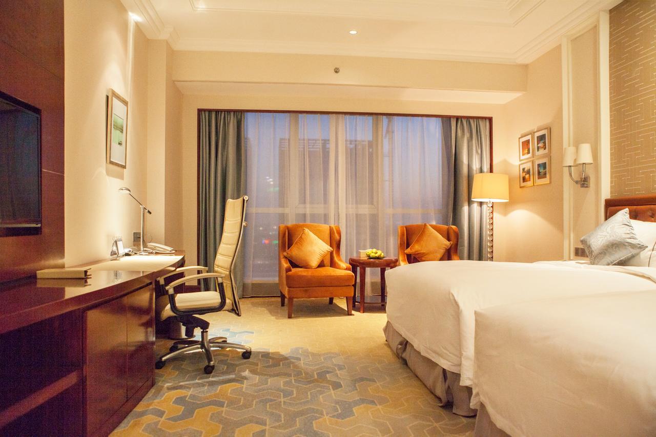 Glory Charm Hotel Fangcheng Exterior photo