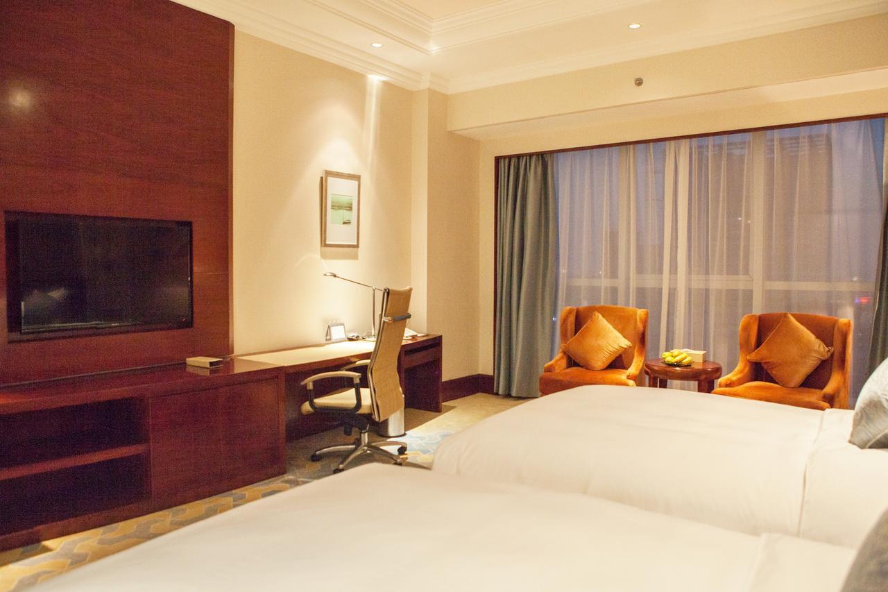 Glory Charm Hotel Fangcheng Exterior photo