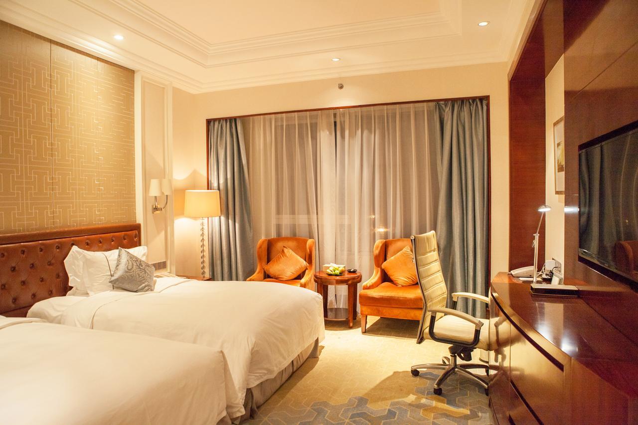 Glory Charm Hotel Fangcheng Exterior photo