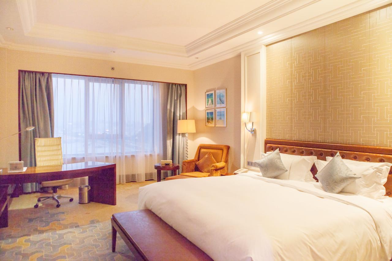 Glory Charm Hotel Fangcheng Exterior photo